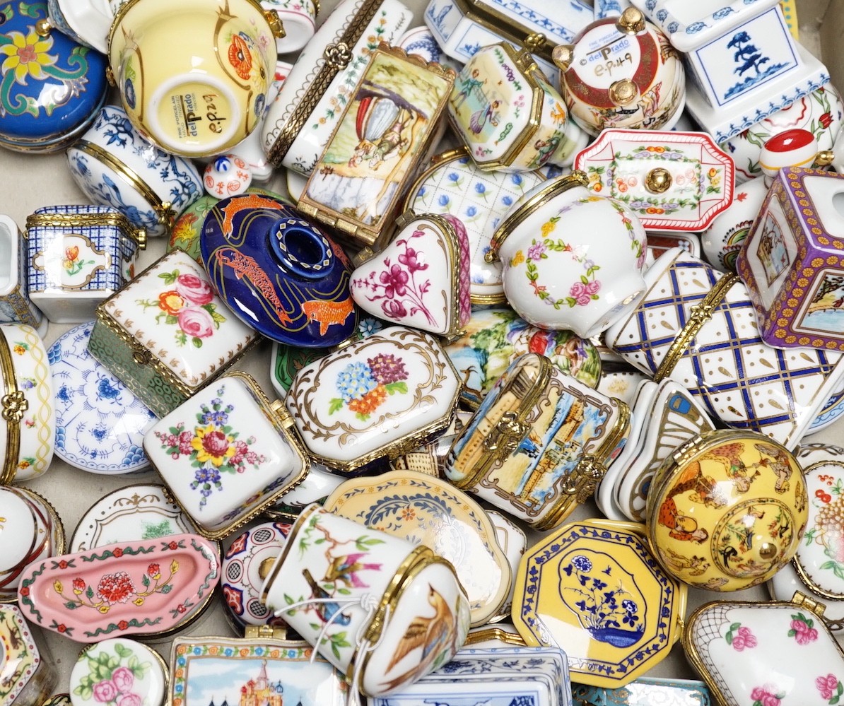 A quantity of approximately sixty Del Prado oriental and classic collection porcelain boxes, together with accompanying book and ephemera